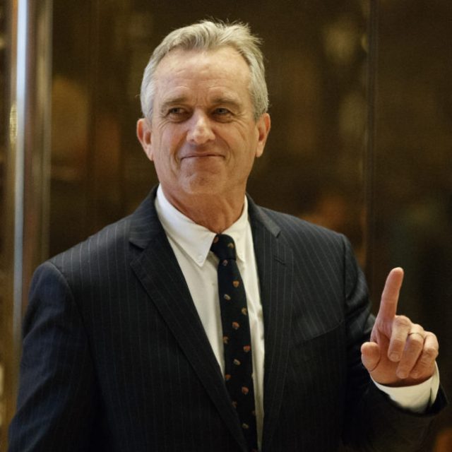 Robert F. Kennedy Jr. arrives in the lobby of Trump Tower in New York, Tuesday, Jan. 10, 2017, for a meeting with President-elect Donald Trump. (AP Photo/Evan Vucci)